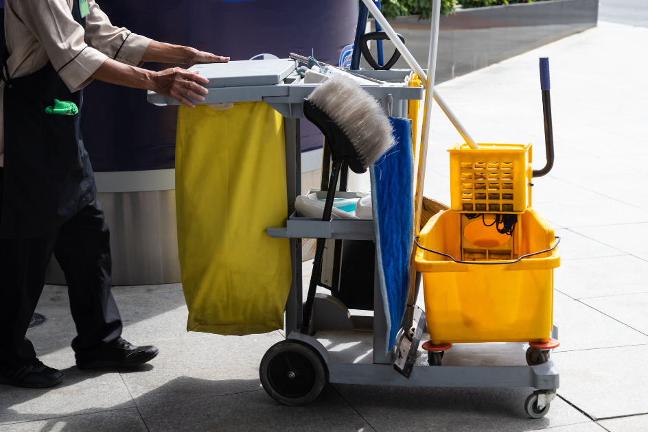 A janitor cart with cleaning supplies